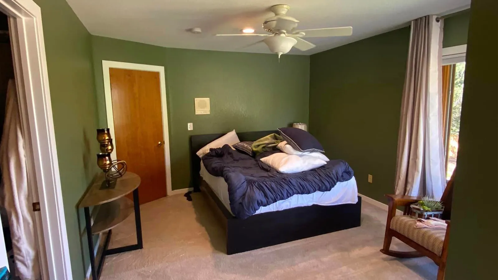Interior Painter Roseville CA Stylish kitchen with newly painted cabinets by Plata Painting co